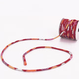 Chirimen Fabric Cord - 1/9in Small Colorful Mums on Red (Quantity) 1=1yard