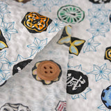 Rippled Cotton Demon Slayer on White (Length) 1=0.25yard