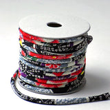 Chirimen Fabric Cord - 1/9in Cherry Kanoko Dots on Black (Quantity) 1=1yard