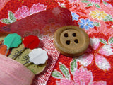 Shadowy Cherry Blossoms with Temari Ball on Red (Length) 1=0.25yard