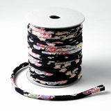 Chirimen Fabric Cord - 1/6in Tiny Cherry Blossoms on Black (Quantity) 1＝1yard