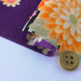 Fans and Flowers on Purple (Length) 1＝0.25yard